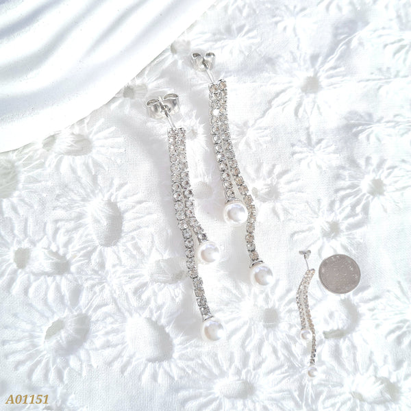 Arete cadena en zircones y perla