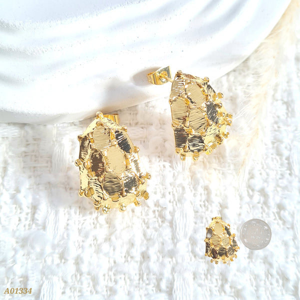 Arete ovalado con textura A01334