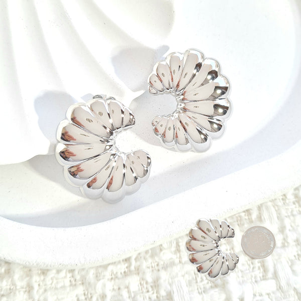 Arete plateado textura caracol A01649