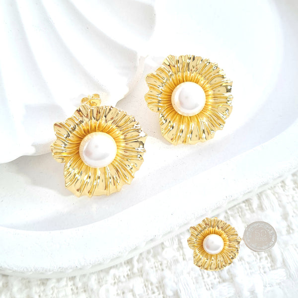 Arete flor con perla A01671