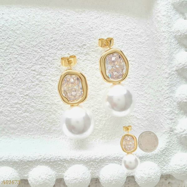 Arete doble perla A01673