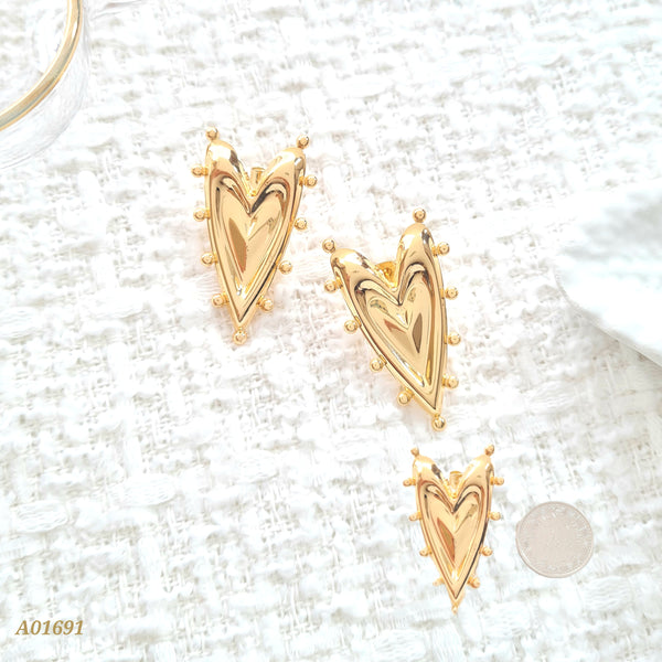 Arete corazón borde balines A01691