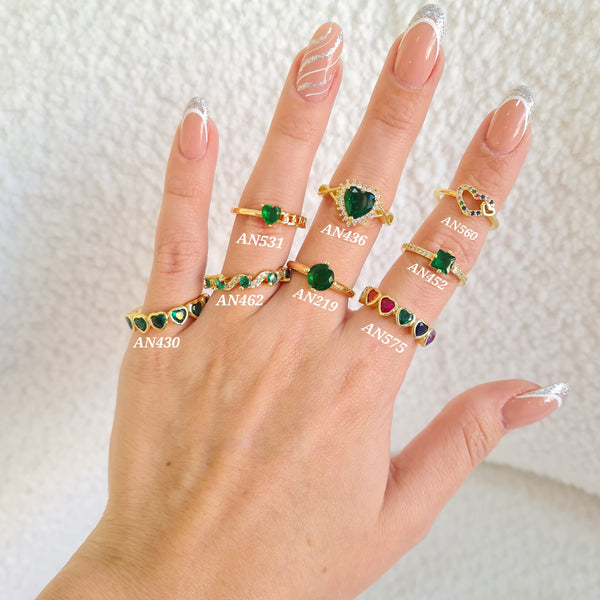 Anillos con zircones verdes