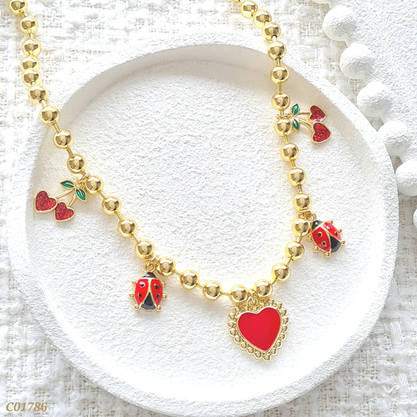 Cadena balines dijes cereza, mariquita y corazón C01786