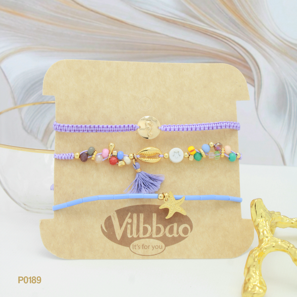 Trio de pulseras en tonos lila P0189