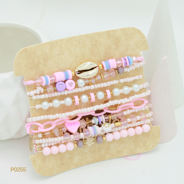 Set de pulseras en tonos rosados P0255