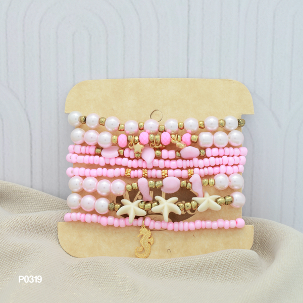 Set de pulseras en tonos rosados P0319