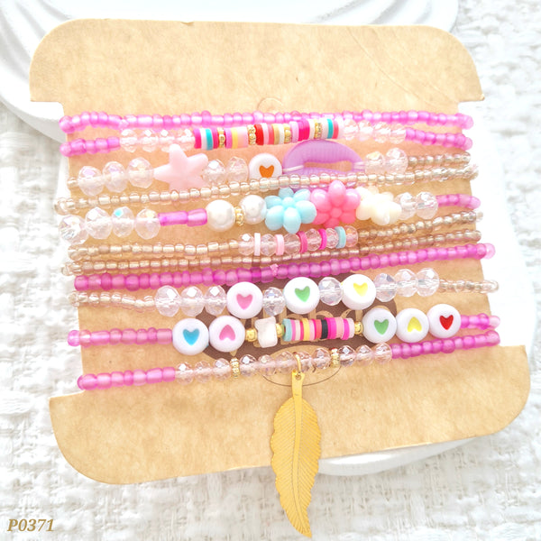 Set de pulseras en tonos fucsia y flores P0371