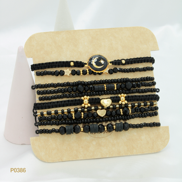 Set de pulseras en color negro y luna P0386