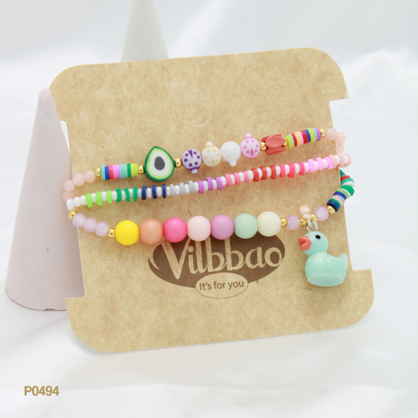 Set pulseras multicolor y dije pato P0494