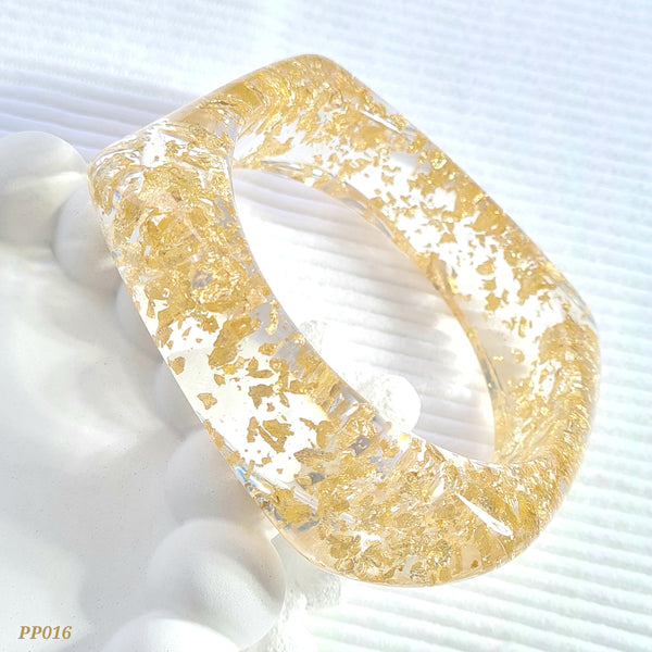 Pulso traslucido con dorado PP016