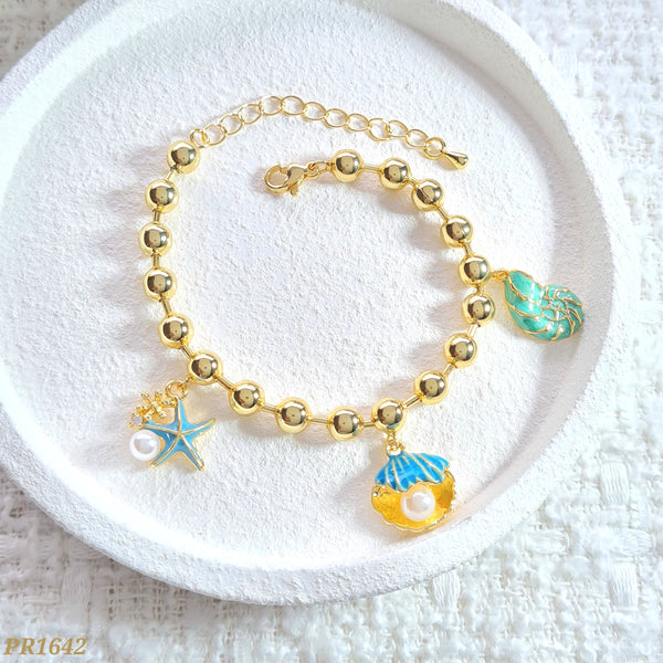 Pulsera rodio balines dijes estrella/concha/caracol PR1642