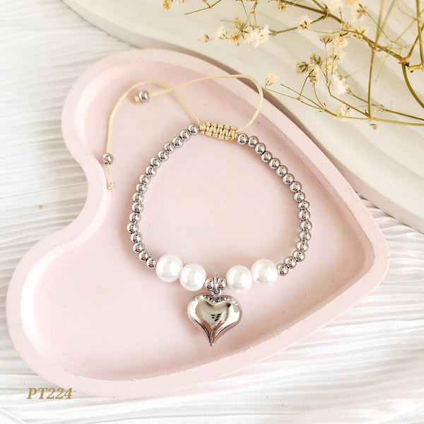 Pulsera con balines, perlas y corazón