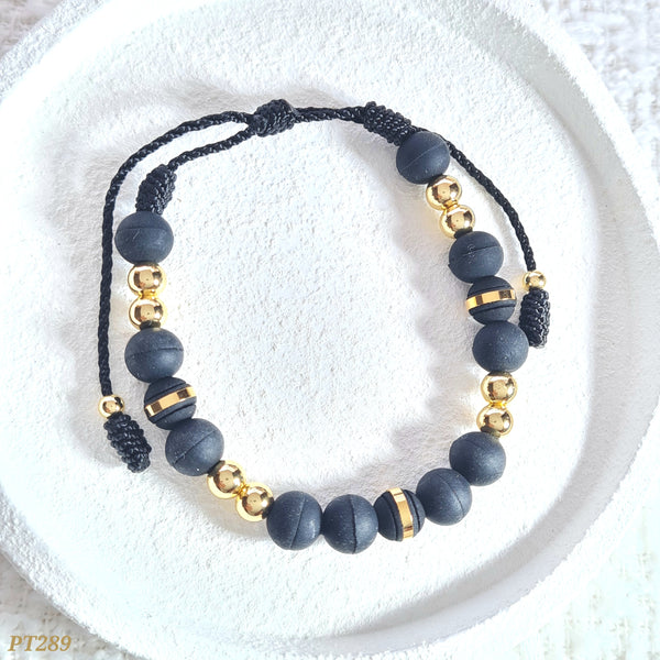 Pulsera neopreno negro con balines PT289