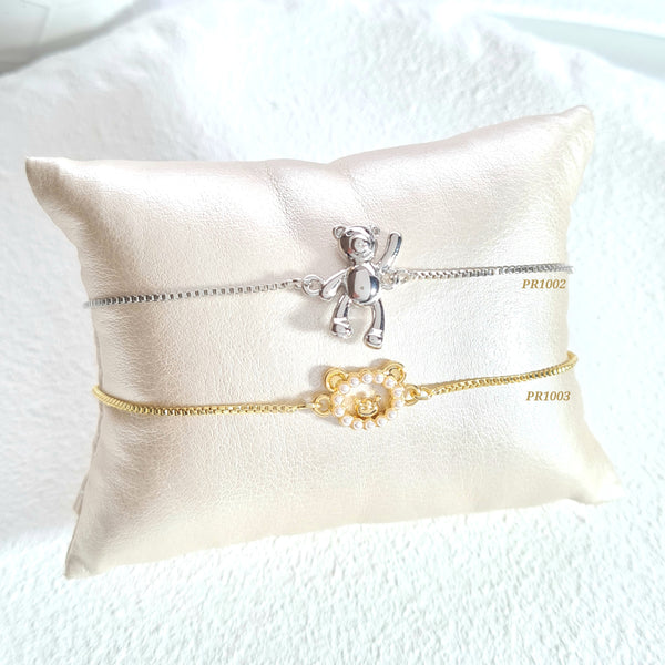 Pulsera oso plateado/ Pulsera oso perlas  (cada una)