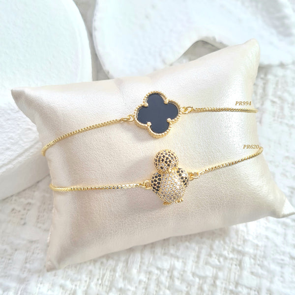 Pulsera trébol negro / Pulsera pingüino (cada una)