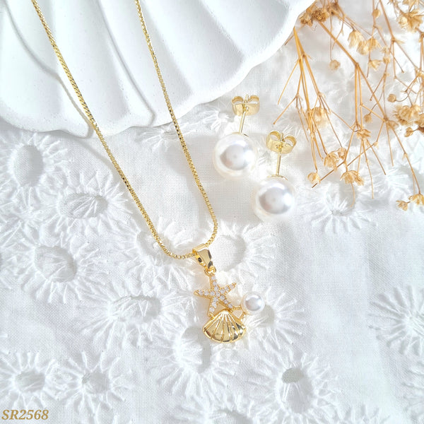 Set concha y estrella con perla SR2568