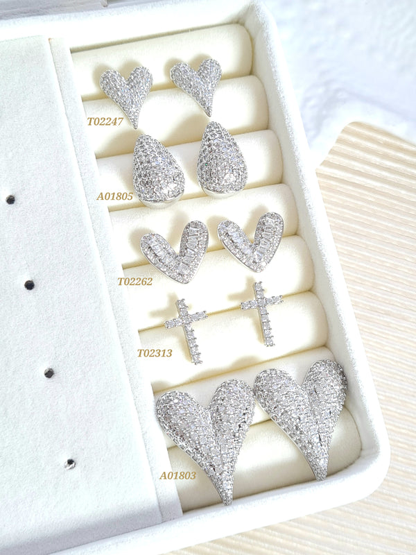 Topos plateados con zircones