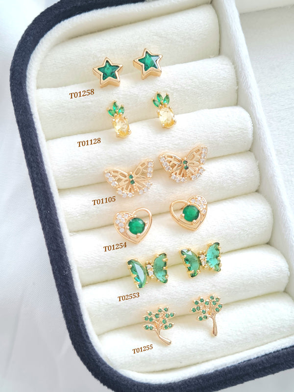 Topos con zircones verdes