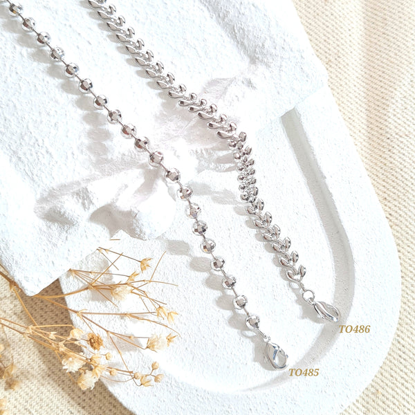 Tobilleras plateadas con textura