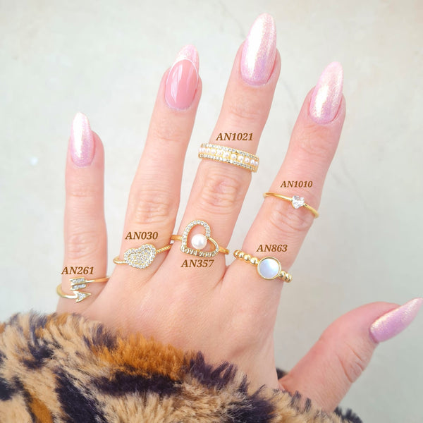 Anillos figuras con detalles en zircones AN261